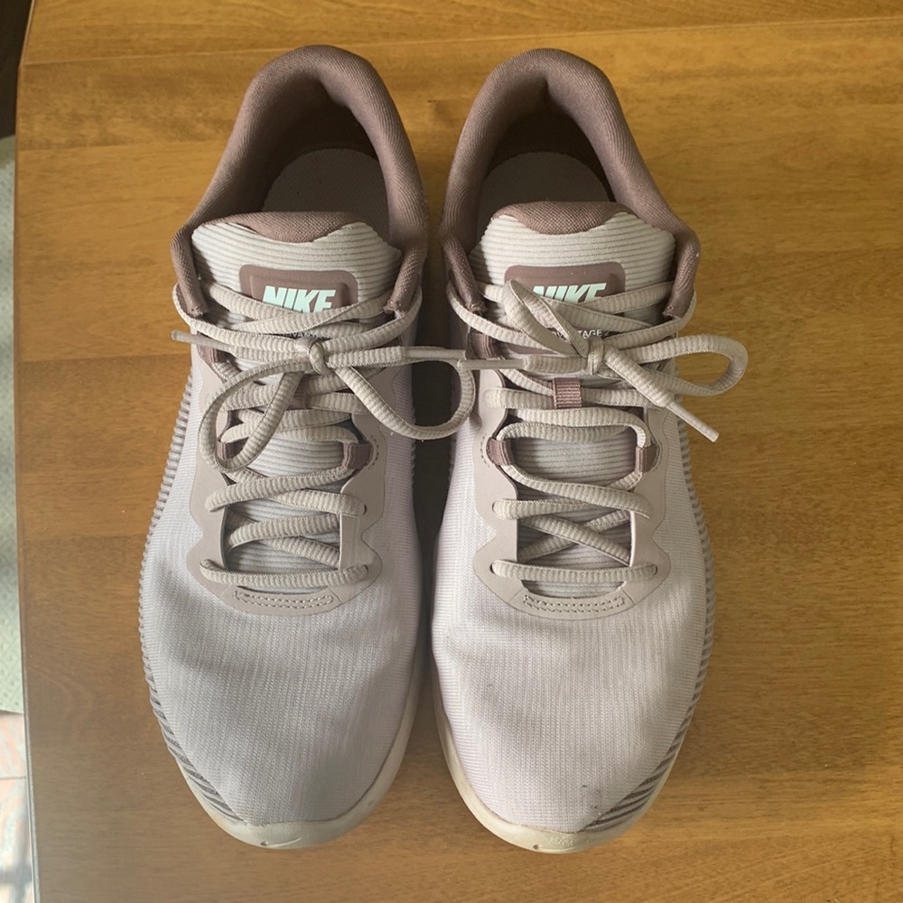 Womens Nike tennis shoes.  Size 9.5. Used.